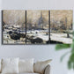 Three-panel canvas wall art featuring snowy village road in winter, displayed in a living room above a sofa.