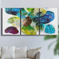 Three-panel canvas wall art featuring expressive abstract color interpretations, displayed in a living room above a sofa.