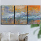 Three-panel canvas wall art featuring bridge shrouded in fog and smoke, displayed in a living room above a sofa.