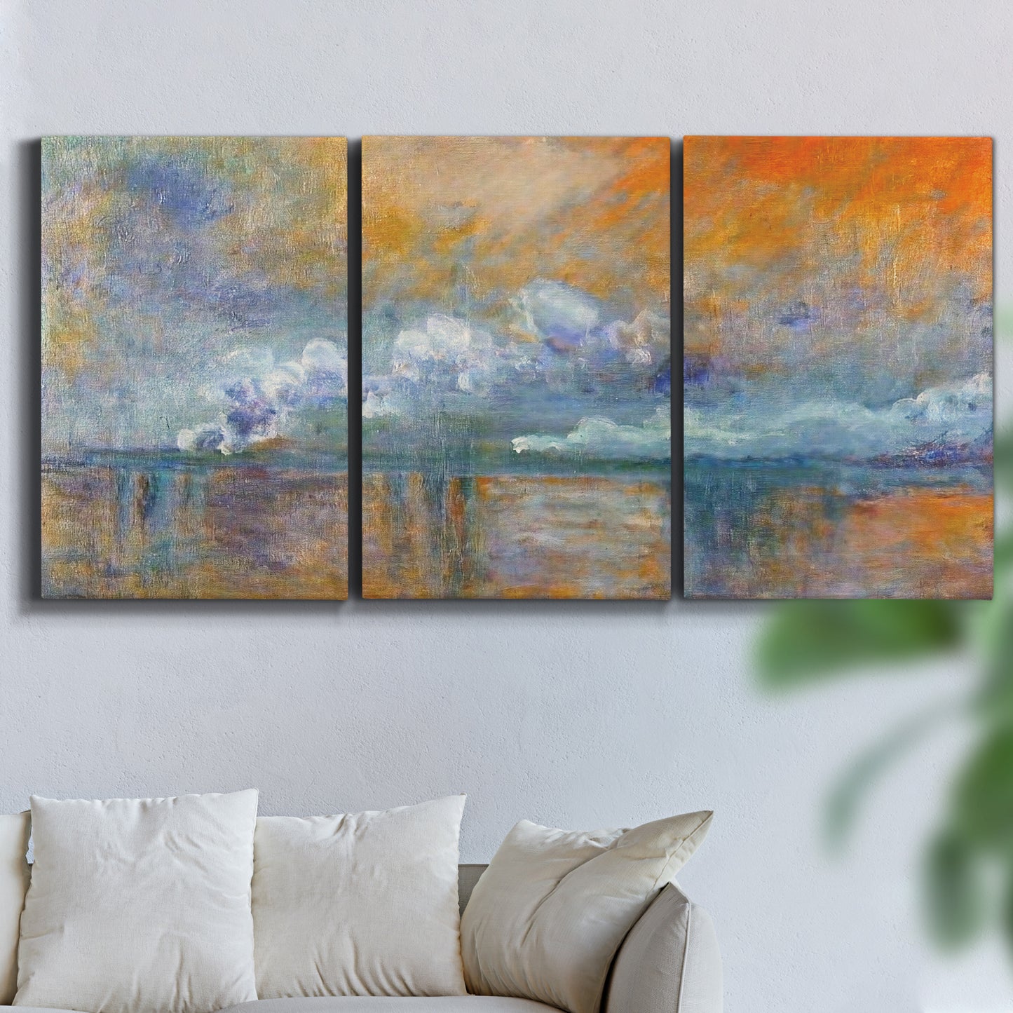 Three-panel canvas wall art featuring bridge shrouded in fog and smoke, displayed in a living room above a sofa.