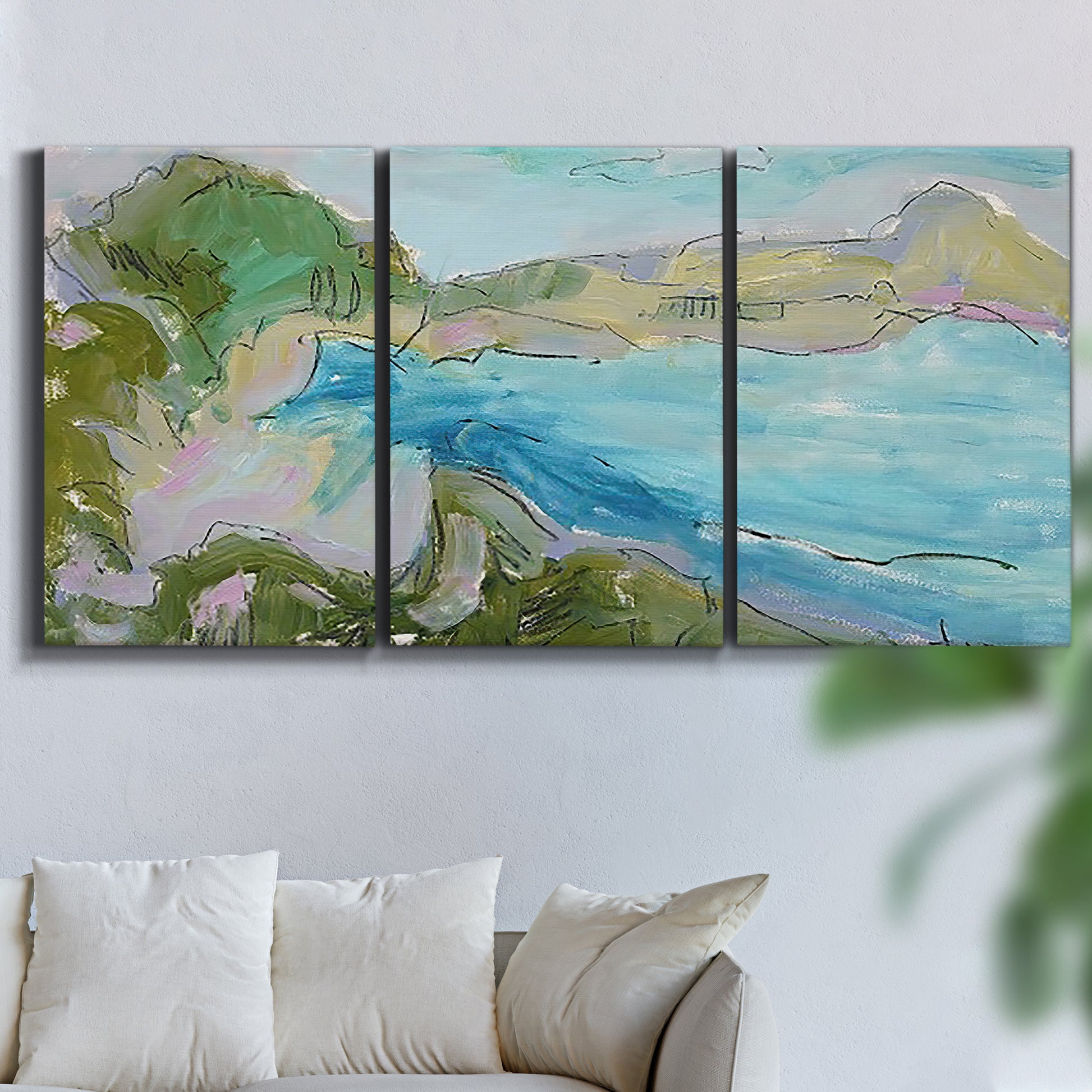 Three-panel canvas wall art featuring open landscape with landing strip, displayed in a living room above a sofa.
