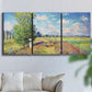 Three-panel canvas wall art featuring sunlit meadow landscape, displayed in a living room above a sofa.