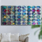 Three-panel canvas wall art featuring contrasting geometric abstract variations, displayed in a living room above a sofa.