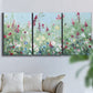 Three-panel canvas wall art featuring night landscape silhouette photography, displayed in a living room above a sofa.