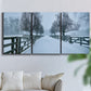 Three-panel canvas wall art featuring snow covered rural road photograph, displayed in a living room above a sofa.