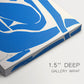 Close-up of a gallery-wrapped canvas corner showing a striking abstract figure with simplified curves, highlighting texture and print detail.