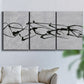 Three-panel canvas wall art featuring minimal abstract frequency lines, displayed in a living room above a sofa.