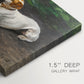 Canvas art print of a dog lying on ground with head raised in natural outdoor setting, highlighting texture and gallery-wrapped edges