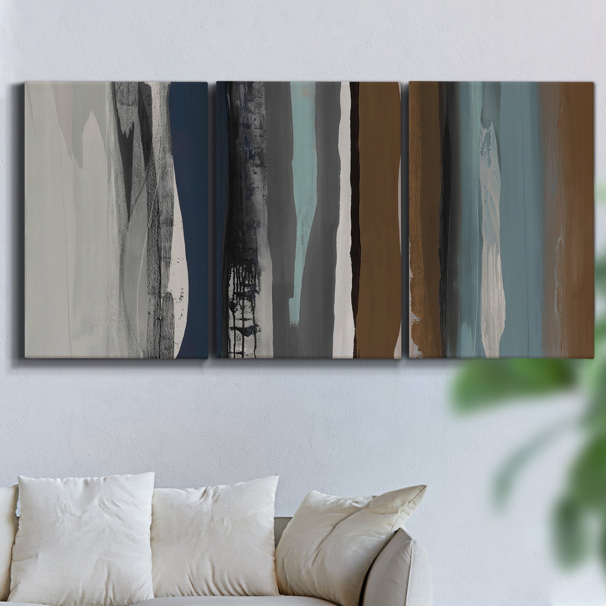 Three-panel canvas wall art featuring layered abstract amusement park tones, displayed in a living room above a sofa.