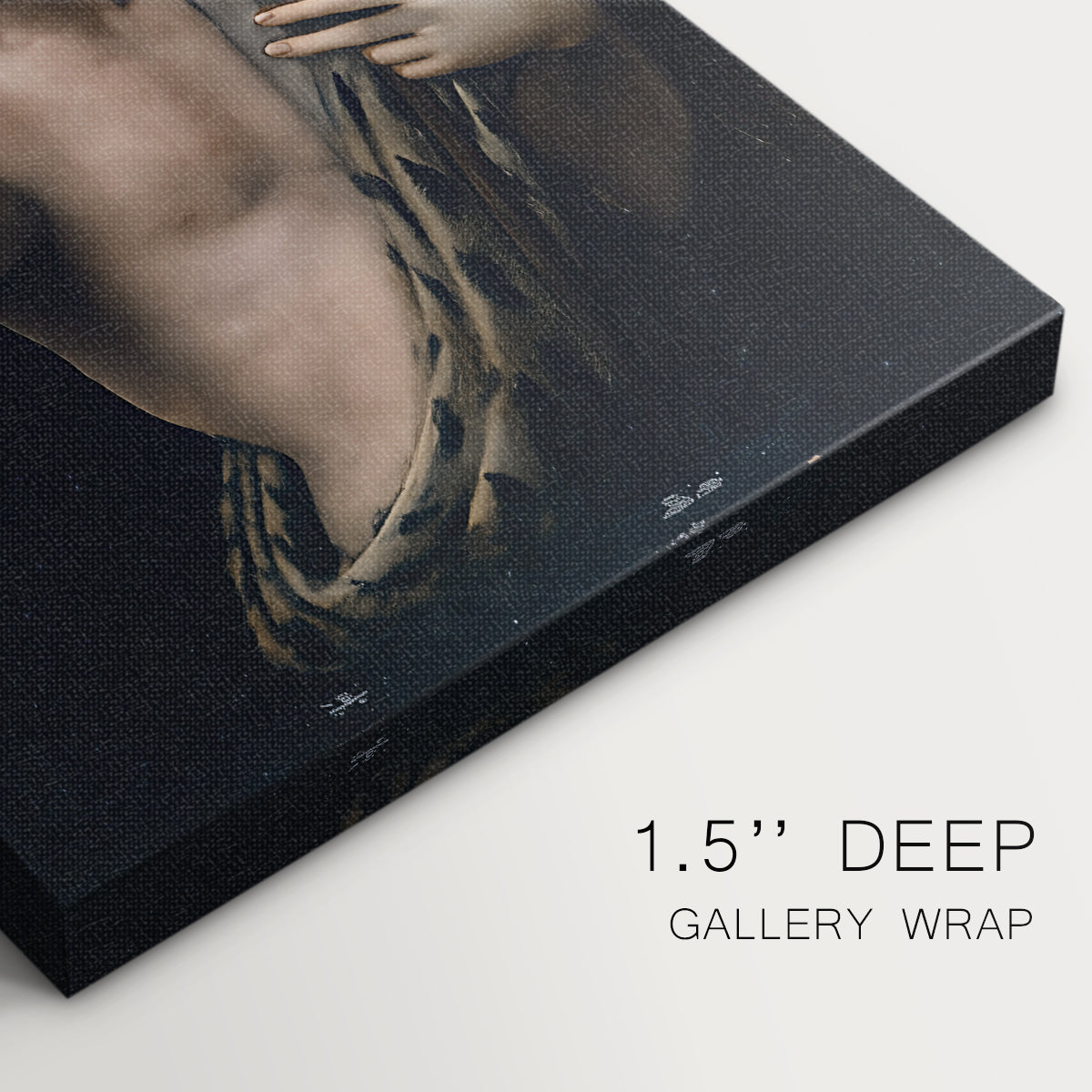 Close-up of a gallery-wrapped canvas corner showing a calm portrait with strong contrast and depth, highlighting texture and print detail.