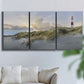 Three-panel canvas wall art featuring guardian boat along shoreline, displayed in a living room above a sofa.