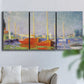 Three-panel canvas wall art featuring red boats along riverbank, displayed in a living room above a sofa.
