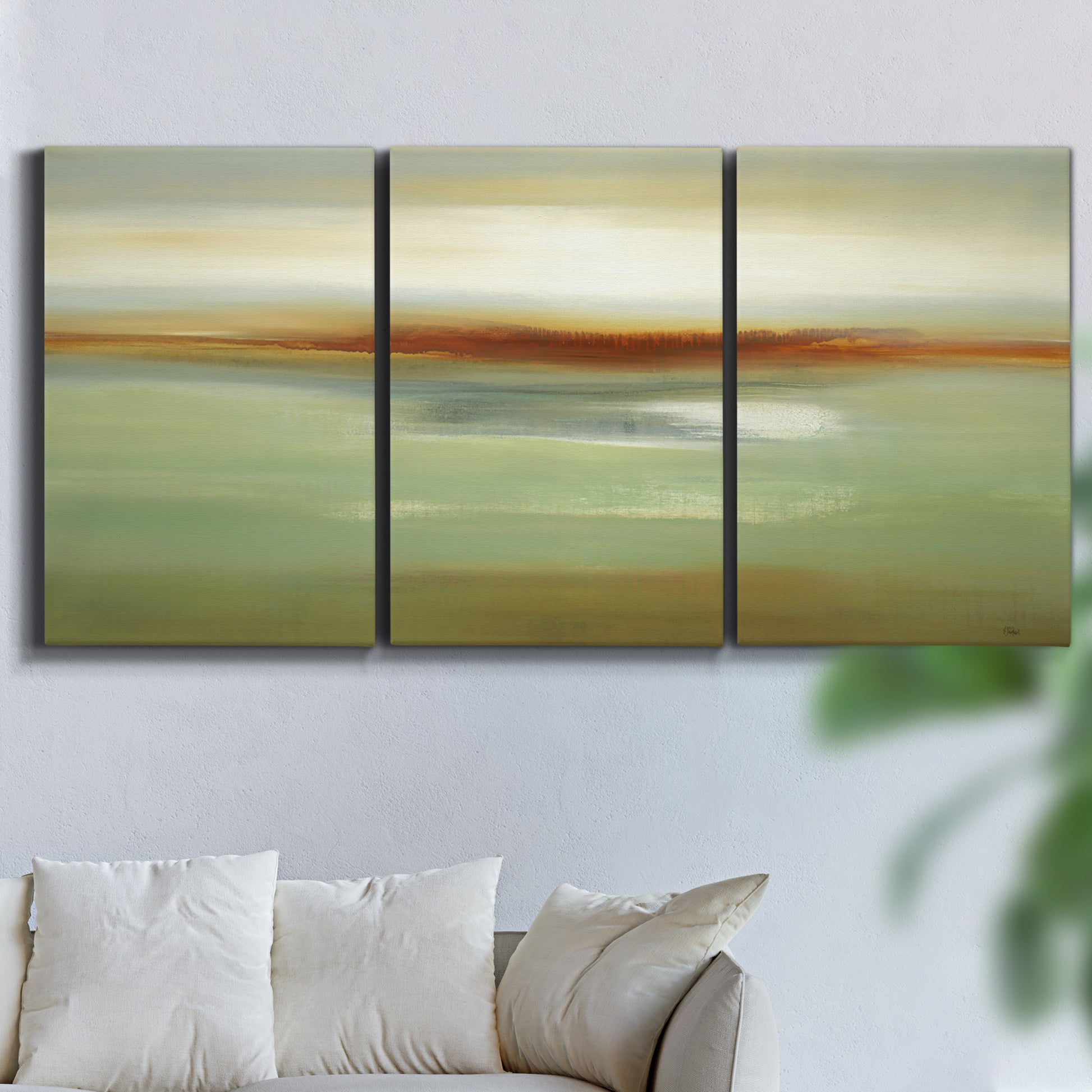 Three-panel canvas wall art featuring green focused abstract color vision, displayed in a living room above a sofa.