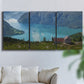 Three-panel canvas wall art featuring symmetrical water reflections with trees, displayed in a living room above a sofa.