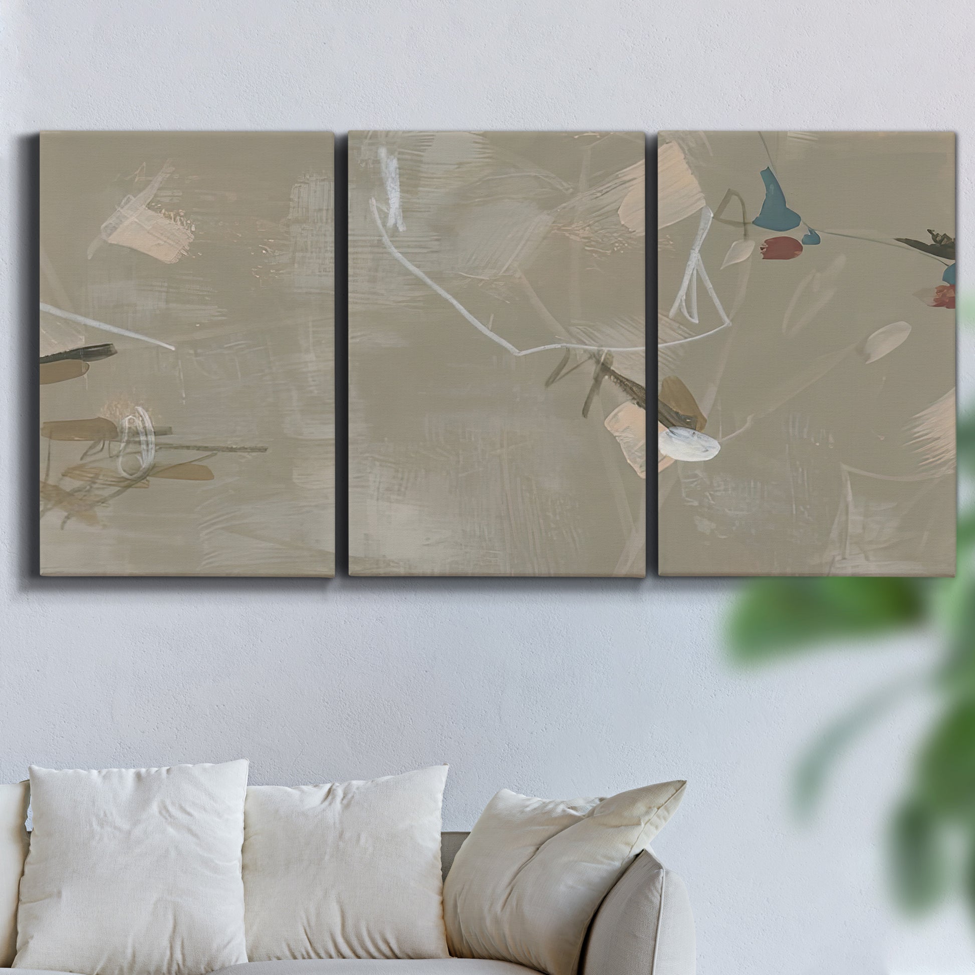 Three-panel canvas wall art featuring mid century terrazzo inspired abstraction, displayed in a living room above a sofa.