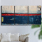 Three-panel canvas wall art featuring weathered coastal dock scene, displayed in a living room above a sofa.