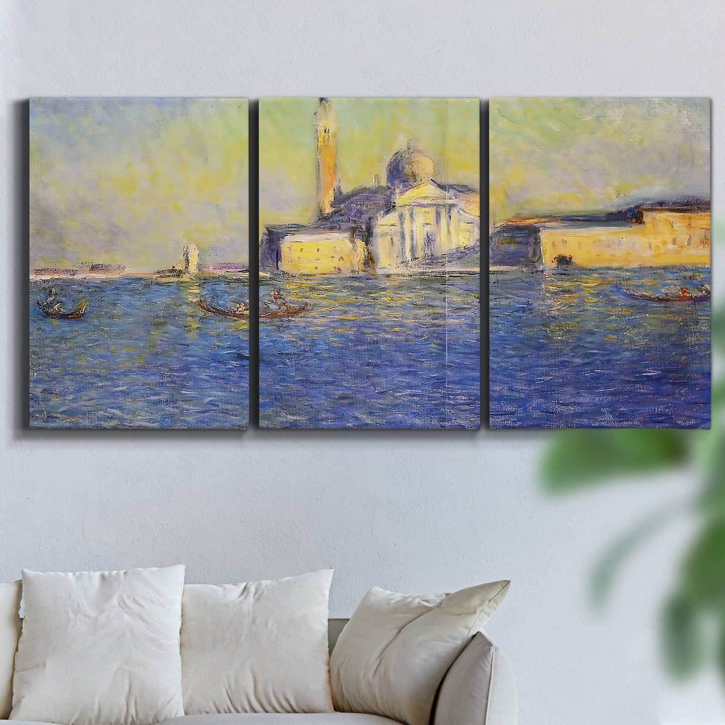 Three-panel canvas wall art featuring layered modern abstract color ribbons, displayed in a living room above a sofa.
