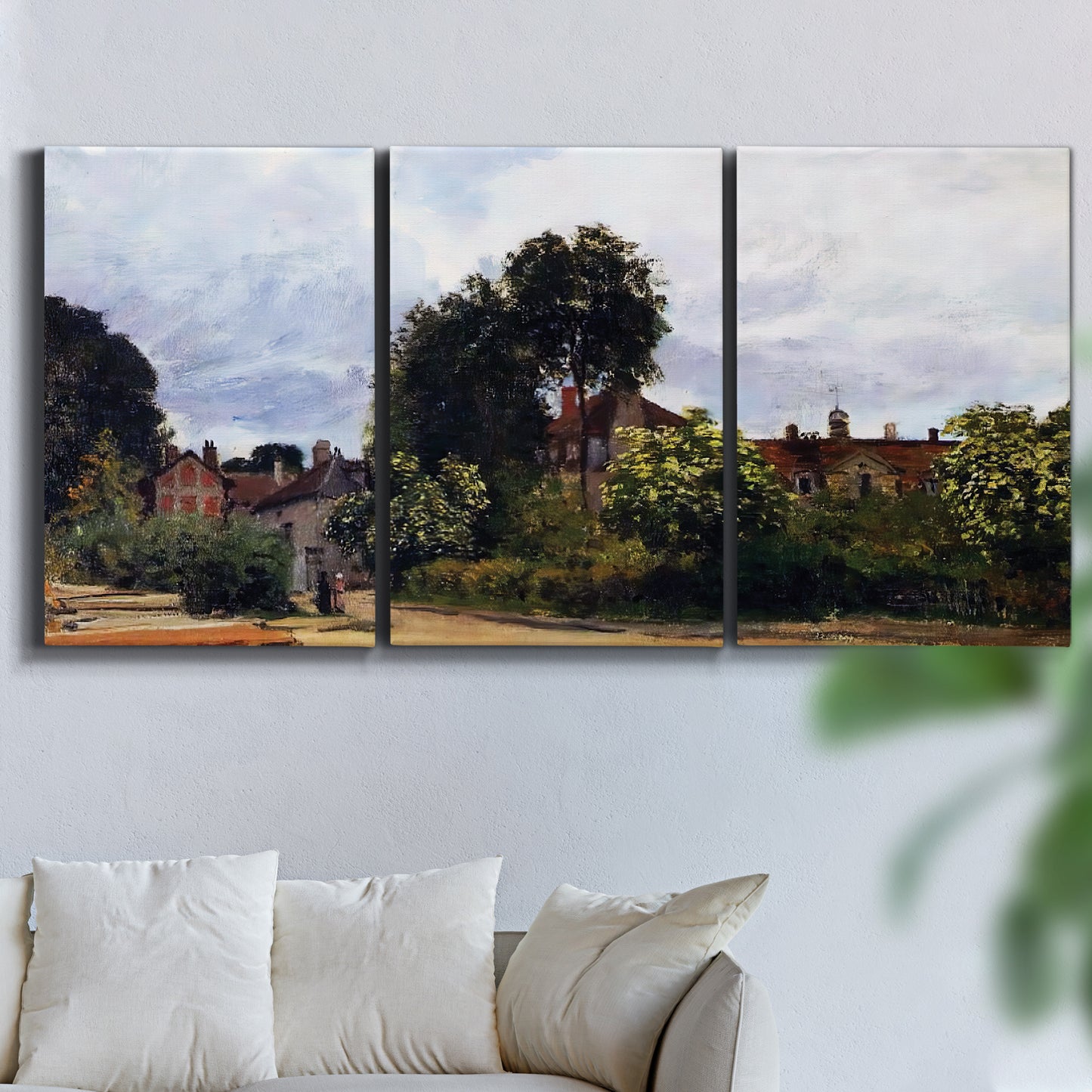Three-panel canvas wall art featuring garden corner with flowering trees, displayed in a living room above a sofa.
