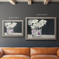 Contemporary floral watercolor with white flowers in an ornate vintage silver frame shown in multiple size options.