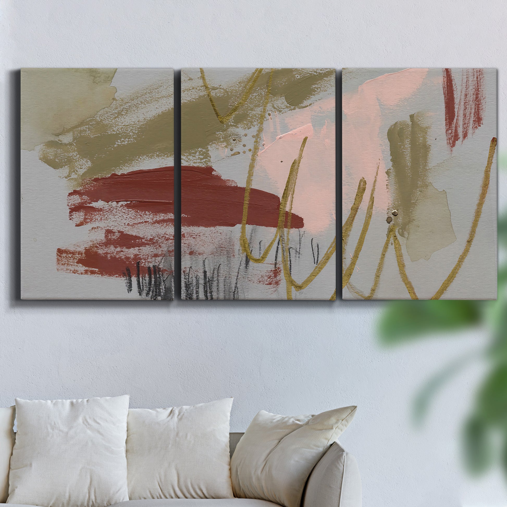 Three-panel canvas wall art featuring minimalist abstract line textures, displayed in a living room above a sofa.