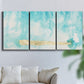 Three-panel canvas wall art featuring saturated abstract color fields, displayed in a living room above a sofa.
