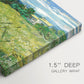 Canvas art print of a wheat field with tall cypress tree rising against vivid sky, highlighting texture and gallery-wrapped edges