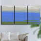 Three-panel canvas wall art featuring abstract coastal inlet landscape, displayed in a living room above a sofa.