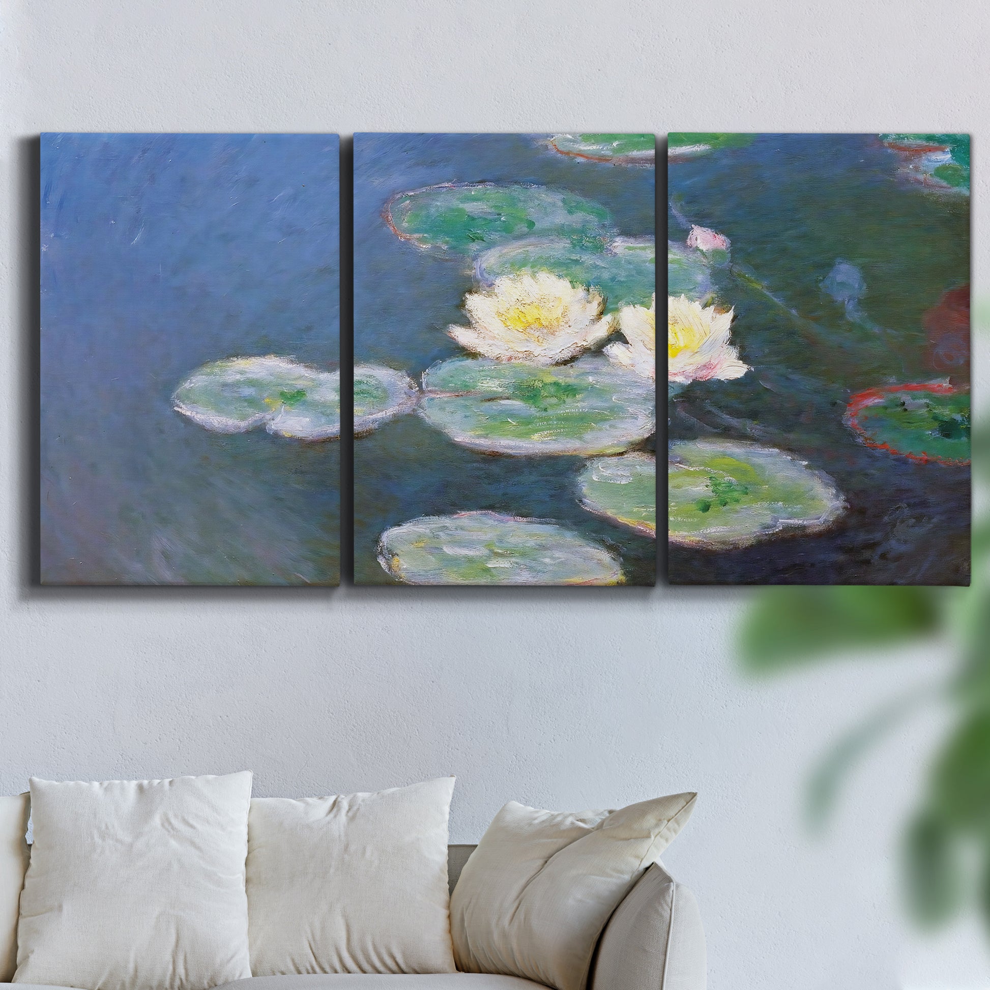 Three-panel canvas wall art featuring water lilies floating on pond, displayed in a living room above a sofa.