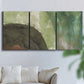 Three-panel canvas wall art featuring layered green abstract composition, displayed in a living room above a sofa.