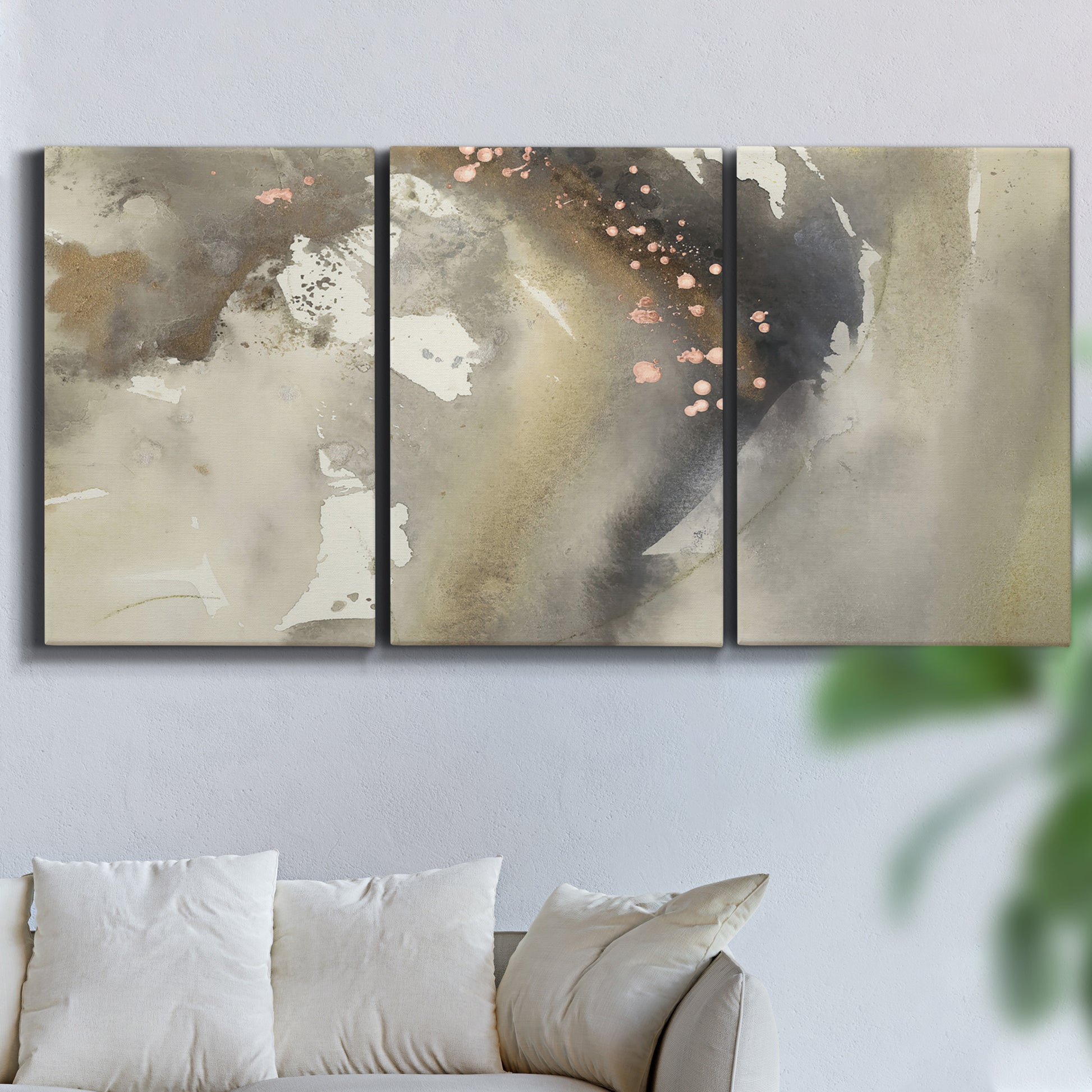 Three-panel canvas wall art featuring flowing abstract wave motion, displayed in a living room above a sofa.