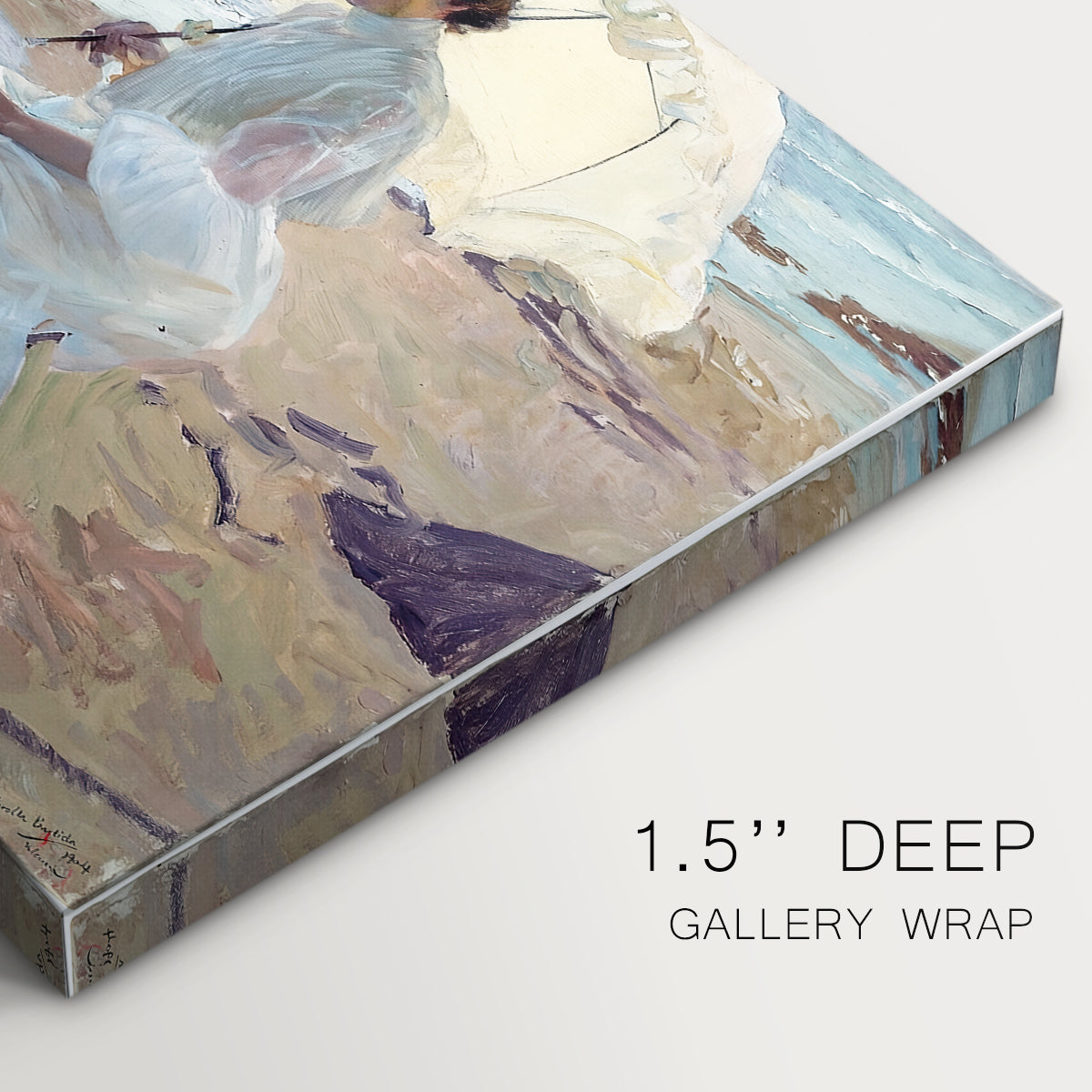 Canvas art print of a woman seated on beach in flowing white dress beside water, highlighting texture and gallery-wrapped edges