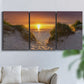 Three-panel canvas wall art featuring sunlit tropical path through greenery, displayed in a living room above a sofa.