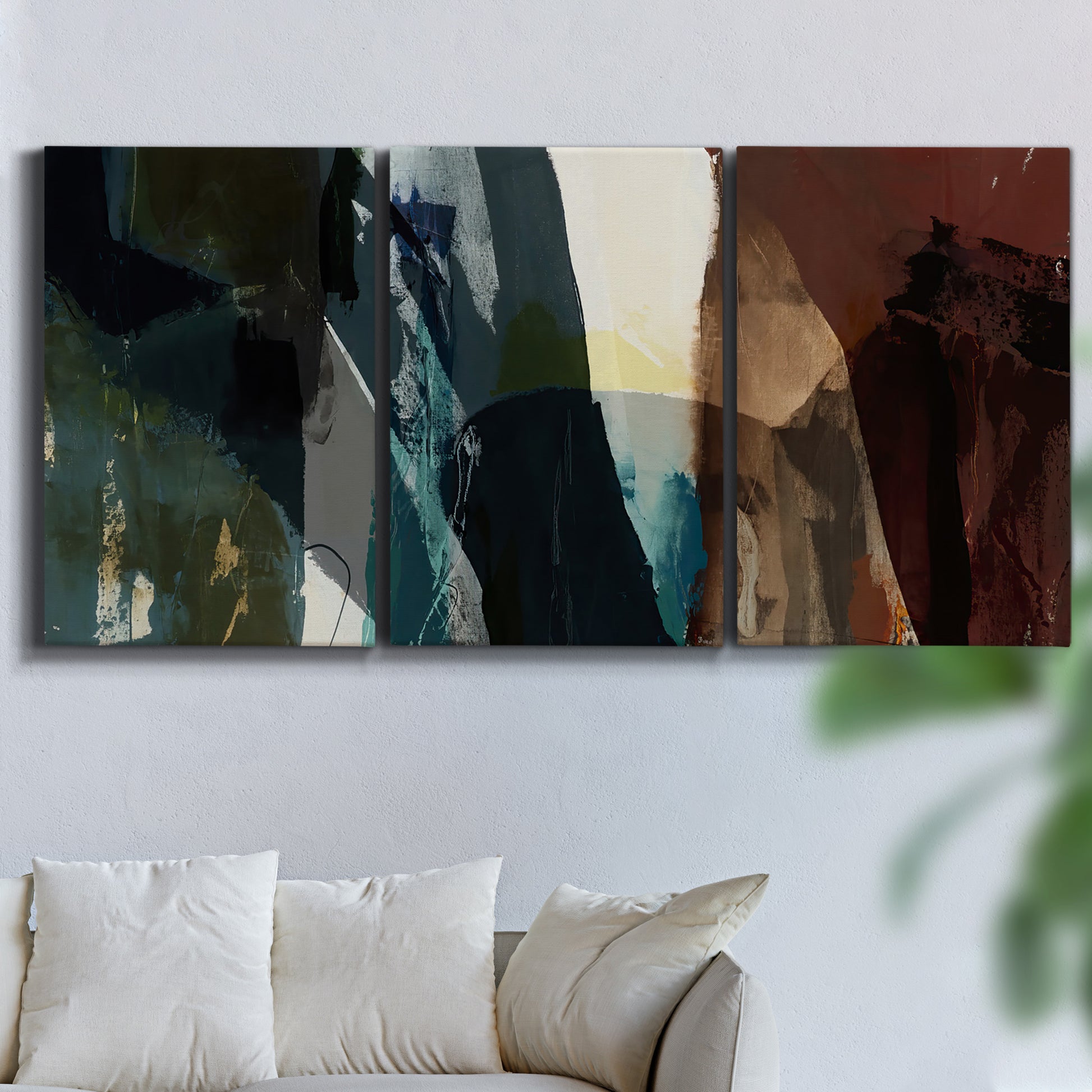 Three-panel canvas wall art featuring layered neutral abstract textures, displayed in a living room above a sofa.