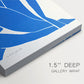 Close-up of a gallery-wrapped canvas corner showing a striking silhouette with strong color contrast, highlighting texture and print detail.