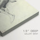 Close-up of a gallery-wrapped canvas corner showing a simple study with soft contours and natural pose, highlighting texture and print detail.