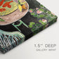 Close-up of a gallery-wrapped canvas corner showing a vivid scene with fluid forms and rich color, highlighting texture and print detail.