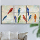 Three-panel canvas wall art featuring whimsical animal chatter illustration, displayed in a living room above a sofa.