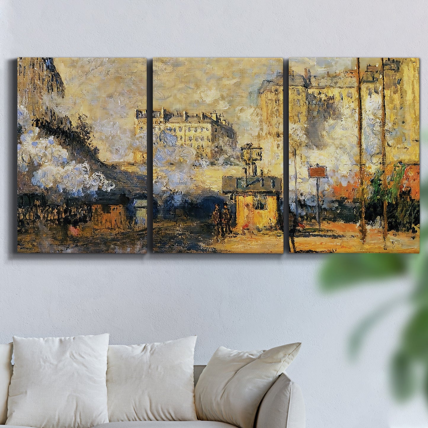 Three-panel canvas wall art featuring calm tropical shoreline at dusk, displayed in a living room above a sofa.