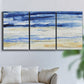 Three-panel canvas wall art featuring turbulent abstract ocean wave motion, displayed in a living room above a sofa.