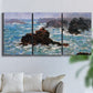 Three-panel canvas wall art featuring storm waves battering rocky coast, displayed in a living room above a sofa.