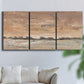 Three-panel canvas wall art featuring soft early evening landscape light, displayed in a living room above a sofa.