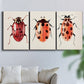 Three-panel canvas wall art featuring ladybugs on green foliage, displayed in a living room above a sofa.