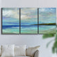 Three-panel canvas wall art featuring narrow island inlet waters, displayed in a living room above a sofa.