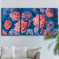 Three-panel canvas wall art featuring layered botanical petal abstractions, displayed in a living room above a sofa.
