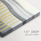 Abstract painting featuring Gray and yellow stripes and lines creating a modern art composition displayed in a minimalistic setting