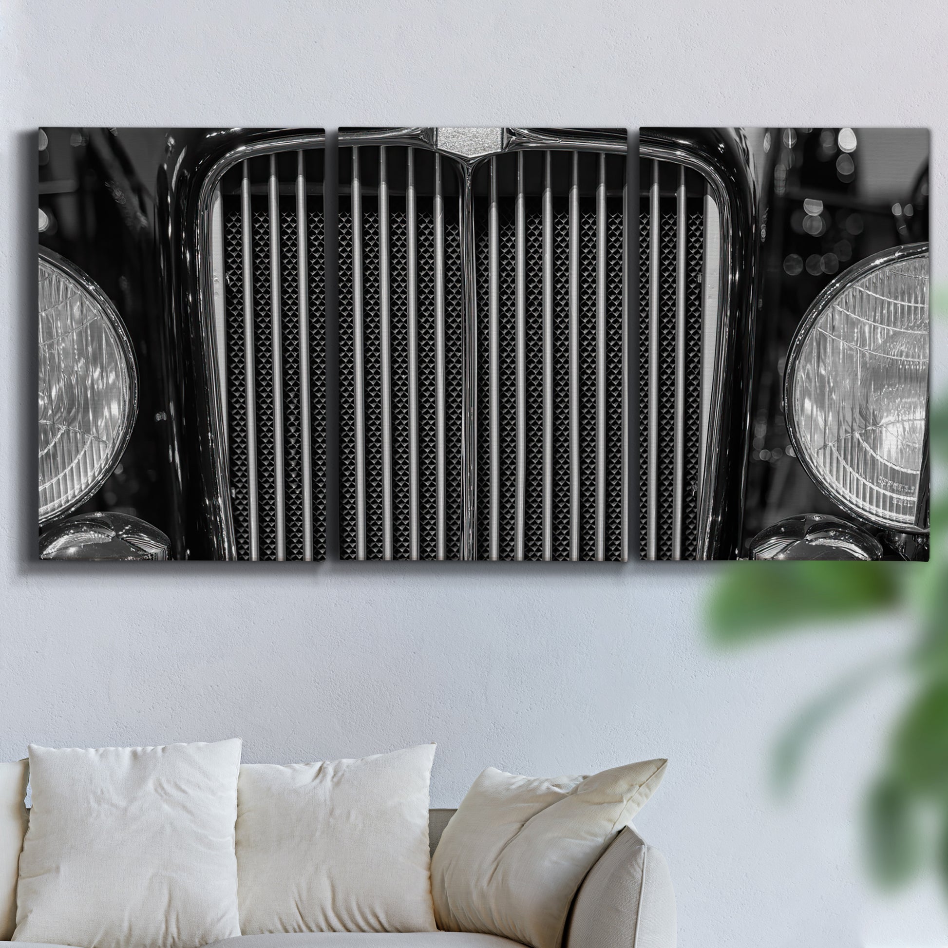 Three-panel canvas wall art featuring vintage car grille detail, displayed in a living room above a sofa.