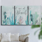 Three-panel canvas wall art featuring coastal typography with seahorses, displayed in a living room above a sofa.