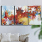 Three-panel canvas wall art featuring abstract city lights composition, displayed in a living room above a sofa.