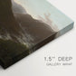 Canvas art print of a mountain valley at sunrise with light spreading across trees and hills, highlighting texture and gallery-wrapped edges