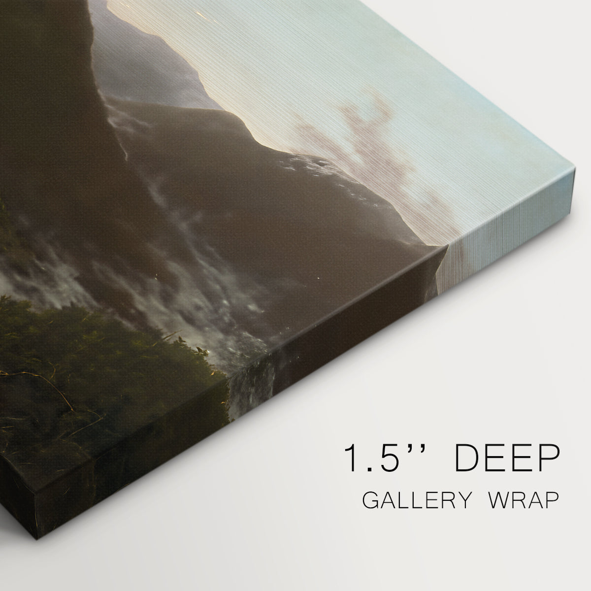 Canvas art print of a mountain valley at sunrise with light spreading across trees and hills, highlighting texture and gallery-wrapped edges